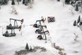 Layout of the city and small figures. Snow-covered area with oil rigs