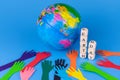 Layout Earth Many Colored Hands Blue Background Earth Day Concept