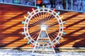 Layout ferris wheel on a wooden background with free space