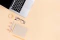 Layout of laptop, glasses and stationery. E-learning concept with copy space Royalty Free Stock Photo