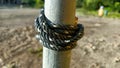 Layout of rope entanglement on iron pole Royalty Free Stock Photo