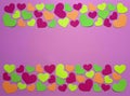 Delicate pink background and hearts cut out of paper with copy space. Top view