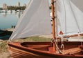 Layout of wooden boat. Old wooden sailboat pulleys and ropes detail Royalty Free Stock Photo