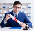 Laywer with diploma roll in legal profession eductional concept Royalty Free Stock Photo