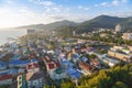 LAZAREVSKOE, SOCHI, KRASNODAR REGION, JULY 5, 2017: View of the beach, amusement park and center of Lazarevskoe city, Sochi, at su