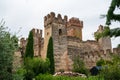 Medieval castle walls and towers of Lazise Italy surrounded by lush greenery at lake garda Royalty Free Stock Photo