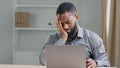 Lazy bored sleeping office worker sleep napping at work African American businessman manager executive falling asleep at Royalty Free Stock Photo