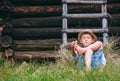 Lazy boy lies in grass under the barn - careless summer on count Royalty Free Stock Photo