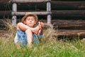 Lazy boy lies in grass under the barn - careless summer on count Royalty Free Stock Photo