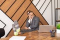 A lazy employee Sitting at a laptop With his feet on the table, A bored concept at work Royalty Free Stock Photo