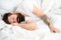 Lazy morning. Man bearded hipster sleepy in bed. Early morning hours. Insomnia and sleep problems. Relax and sleep Royalty Free Stock Photo