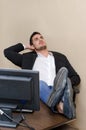 Lazy office worker resting feet on the desk Royalty Free Stock Photo