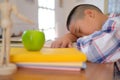 lazy stressed young little asian kid boy resting sleeping on de Royalty Free Stock Photo