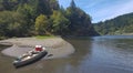 Kayaking on a lazy summer day on Oregon`s Rogue River Royalty Free Stock Photo