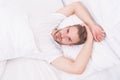 Lazy sunday with morning sex. man lying bedroom. time to relax. male health concept. man awake in bed. carefree single Royalty Free Stock Photo