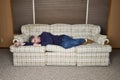 Lazy Tired Man Sleeping and taking a Nap Royalty Free Stock Photo