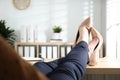 Lazy worker with feet on desk in office Royalty Free Stock Photo