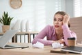 Lazy worker at desk in office Royalty Free Stock Photo