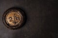 2 lb pound vintage iron weight on metal backdrop