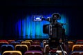The LCD display on the camcorder. Shooting theatrical performances. The TV camera. Colorful chairs in the auditorium Royalty Free Stock Photo