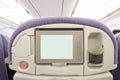 LCD screen in airplane seat Royalty Free Stock Photo