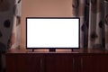 TV in a dim living room, blank screen Royalty Free Stock Photo