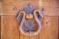 ÃÅ¾ld wooden gate closed on a large barn castle. The old and mysterious wooden gate is closed to a large wooden castle Royalty Free Stock Photo