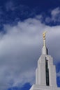 LDS Temple Angel Moroni with a Blue Sky and Clouds Royalty Free Stock Photo