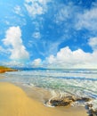 Le Bombarde beach under clouds Royalty Free Stock Photo
