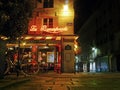 Le Bonaparte - a Paris street corner cafe at night