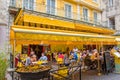 Le CafÃÂ© La Nuit - People enjoy a lucnh at CafÃÂ© van Gogh in Arles Royalty Free Stock Photo