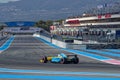 Ancient Formula One car and grand stands on Circuit Paul Ricard