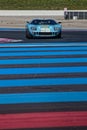 Ford GT40 and blue lines of the track on Circuit Paul Ricard