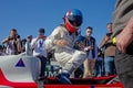 Former Le Mans Winner french driver Eric Helary climbs his car