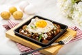 LE COLETTE egg and potato sunny side up served in a dish isolated on table side view of arabian breakfast Royalty Free Stock Photo