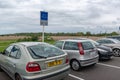 Parked vehicles on a carpool point panel in France