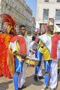 LE MANS, FRANCE - APRIL 22, 2017: Festival Evropa jazz men in colorful costumes play drums in the street