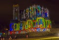 LE MANS, FRANCE - AUGUST 28, 2016: Night of chimera Illuminated perfomance on the wall of Roman and gothic cathedral Royalty Free Stock Photo