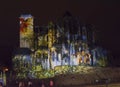 LE MANS, FRANCE - AUGUST 28, 2016: Night of chimera Illuminated perfomance on the wall of Roman and gothic cathedral Royalty Free Stock Photo