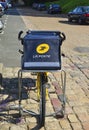 LE MANS, FRANCE - AUGUST 31, 2017: Yellow bicycle of a post office La Poste of French city