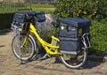 LE MANS, FRANCE - AUGUST 31, 2017: Yellow bicycle of a post office La Poste of French city