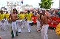 LE MANS, FRANCE - JUNE 13, 2014: Brazilian man dancing at a parade of pilots racing.