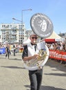 LE MANS, FRANCE - JUNE 16, 2017: Man playing on french horn at a parade of pilots racing in Le mans