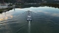 Le Pouzin, France - 2 Octobre, 2022: CFT Rhone barge, flowing along the river in Le Pouzin - Ardeche