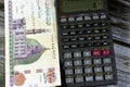 200 LE two hundred Egyptian pounds banknote with Qani-Bay mosque in Cairo Egypt, Pile Egypt cash money bill with a calculator