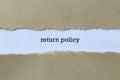 Return policy word on white paper Royalty Free Stock Photo