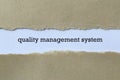 Quality management system on white paper Royalty Free Stock Photo