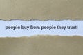 People buy from people they trust on white paper Royalty Free Stock Photo