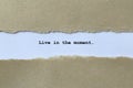 live in the moment on white paper Royalty Free Stock Photo