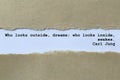 who looks outside dreams who looks inside awakes carl jung on white paper Royalty Free Stock Photo